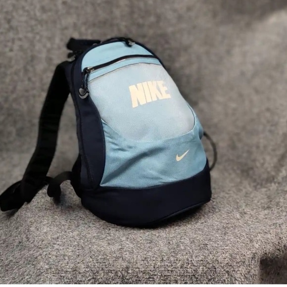grey nike mini backpack Amazon.com: Buddies Insulated Lunch Bag - Allover diagonal stripe texture mesh side pockets with elastic openings padded adjustable shoulder straps soft top haul loop decorative plush charm and woven strap end detail with bold text Nike Brasilia JDI Mini Backpack